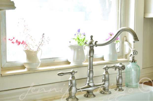 Kitchen sink with stainless steel faucet