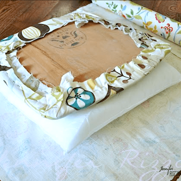 Use a pillow to add to a seat cushion when reupholstering. This is ;ayered over the old fabric and under the new fabric