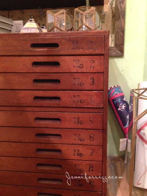 Anthropologie-inspired wooden cabinet featuring nine numbered drawers, elegantly labeled No. 1 to No. 9, perfect for adding a unique touch to your decor. Vintage Store Display Furniture