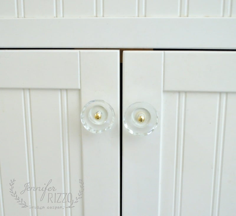 New transparent acrylic cabinet knobs on a white cabinet
