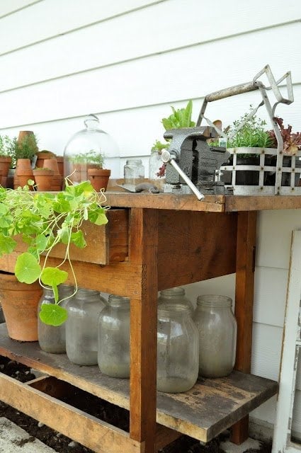 Work bench repurposed as a potting table