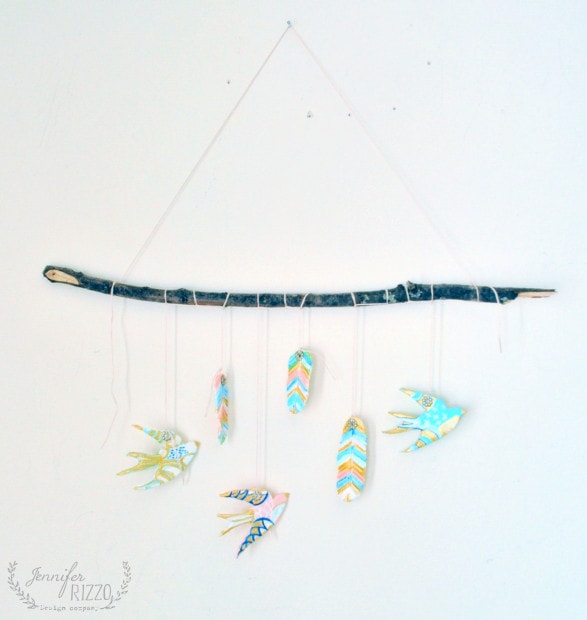 Make a DIY clay bird and feather wall hanging