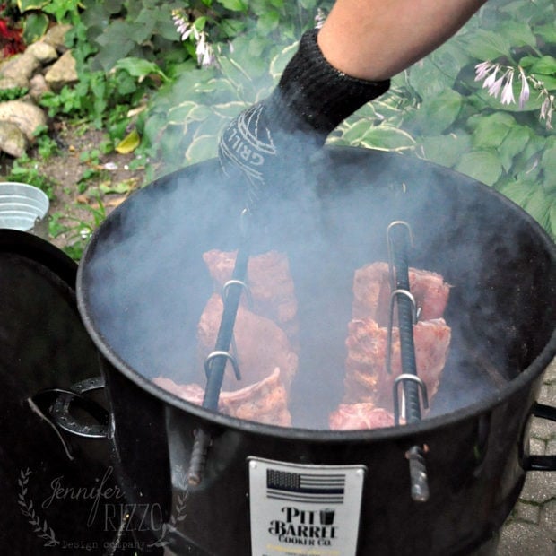 Ribs going into a Pit Barrel Cooker