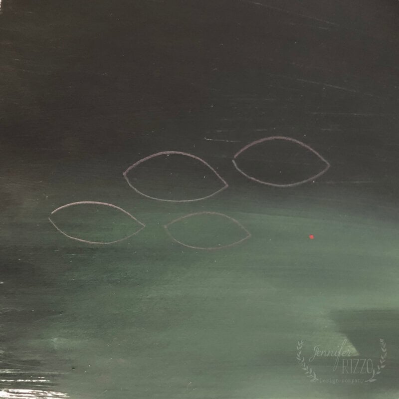 Four leaf-shaped outlines, reminiscent of cut paper still life wall art, are sketched on a dark green and black gradient background. The artist's watermark, "Jennifer Rizzo," appears in the lower right corner.