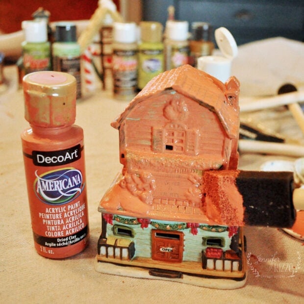 Painting old ceramic thrift store houses for upcycled holiday decor