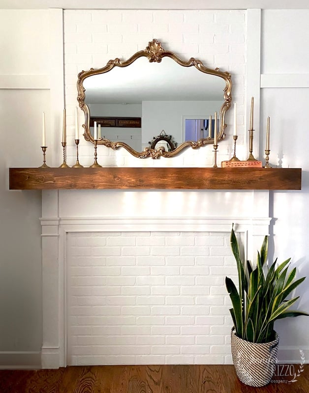 Faux fireplace makeover with faux brick panel