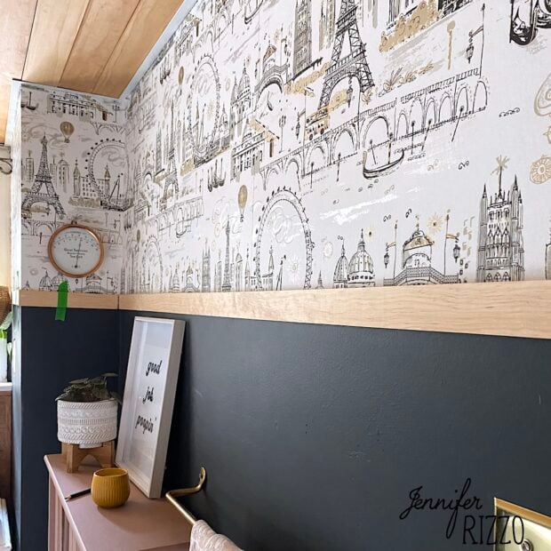 Using a wood trim piece is the best way to transition wallpaper to a painted wall