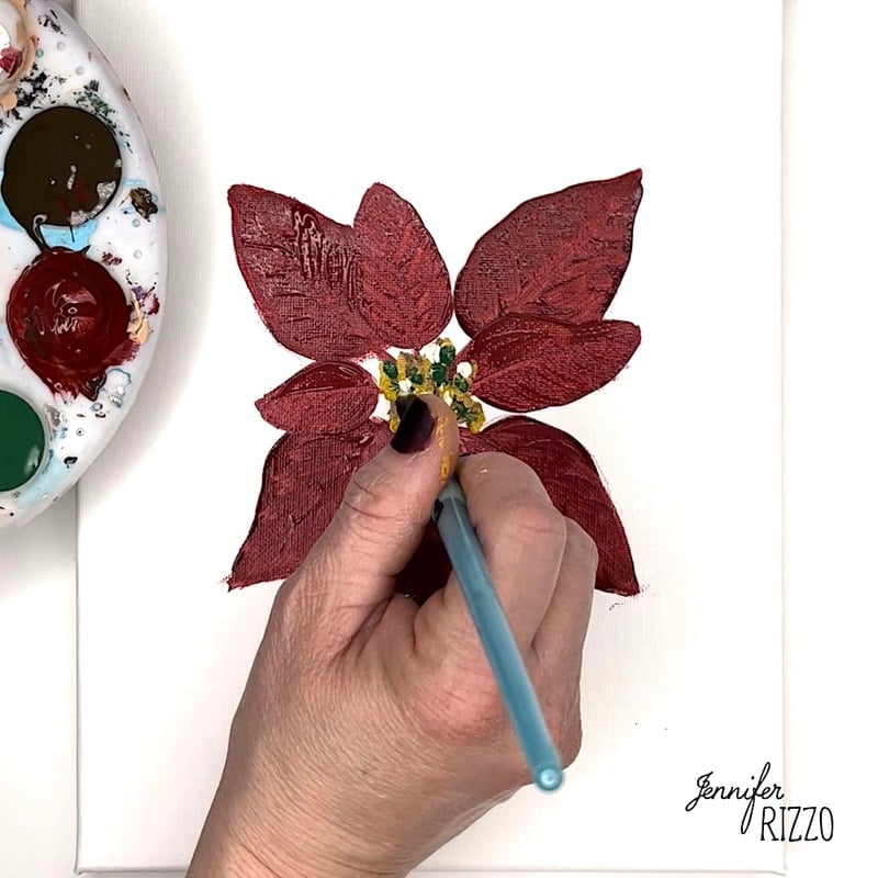 Dab green paint in the center of the flower