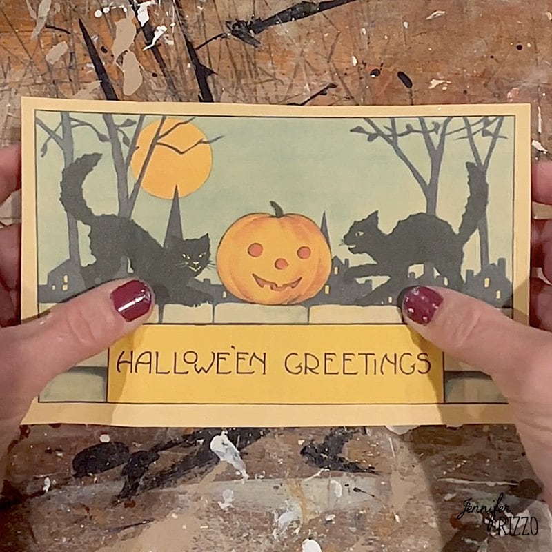 Press paper into place to make vintage-inspired Halloween shelf sitters