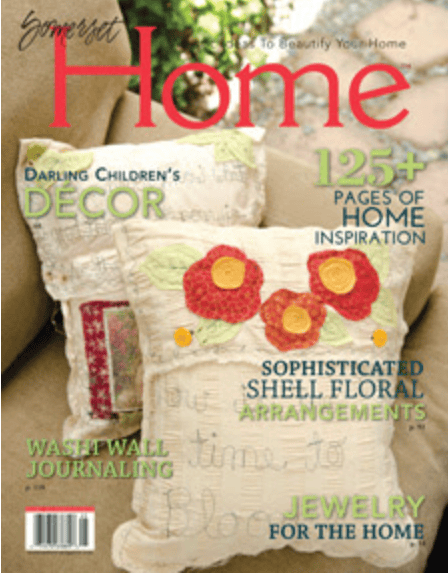 Cover of Somerset Home magazine featuring two decorative pillows with floral designs and text highlighting home decor ideas and inspiration, plus insights about Jennifer Rizzo’s signature style.