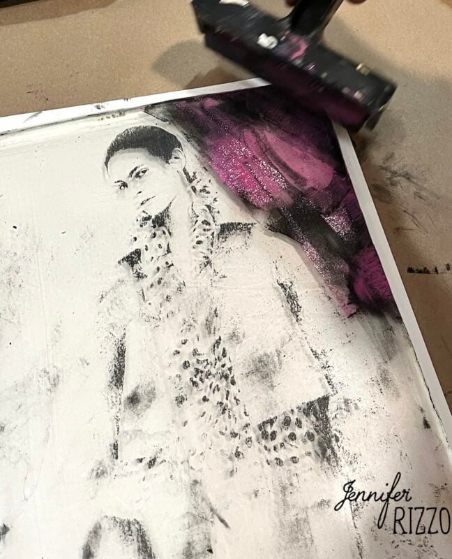 Black and white portrait of a woman with a leopard print scarf, partially overlaid with pink paint, and a hand holding a paint roller in the top right corner. "Jennifer Rizzo" is signed at the bottom.