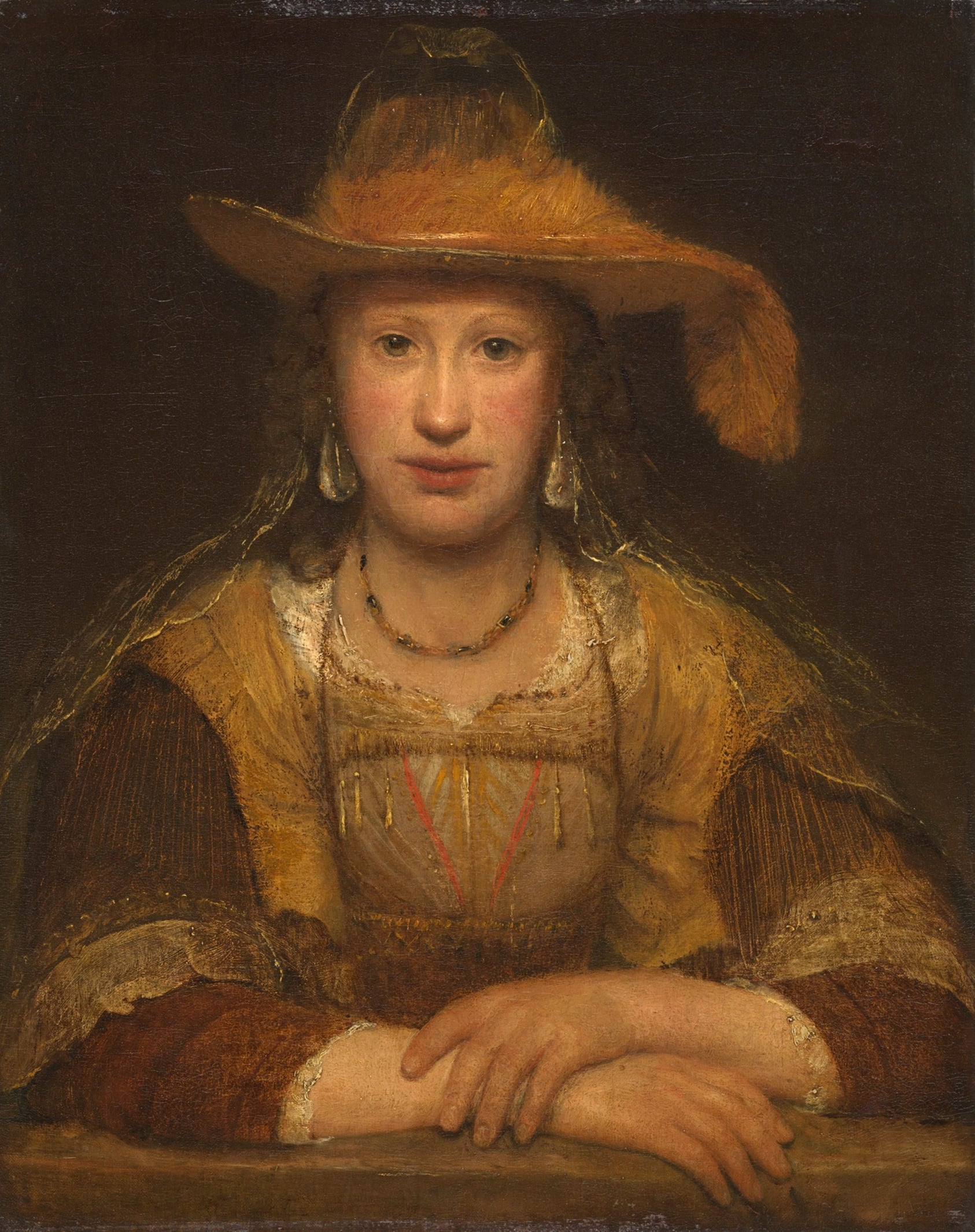 A woman in 17th-century attire with a feathered hat sits at a table, looking forward with hands folded. The background is dark and plain.